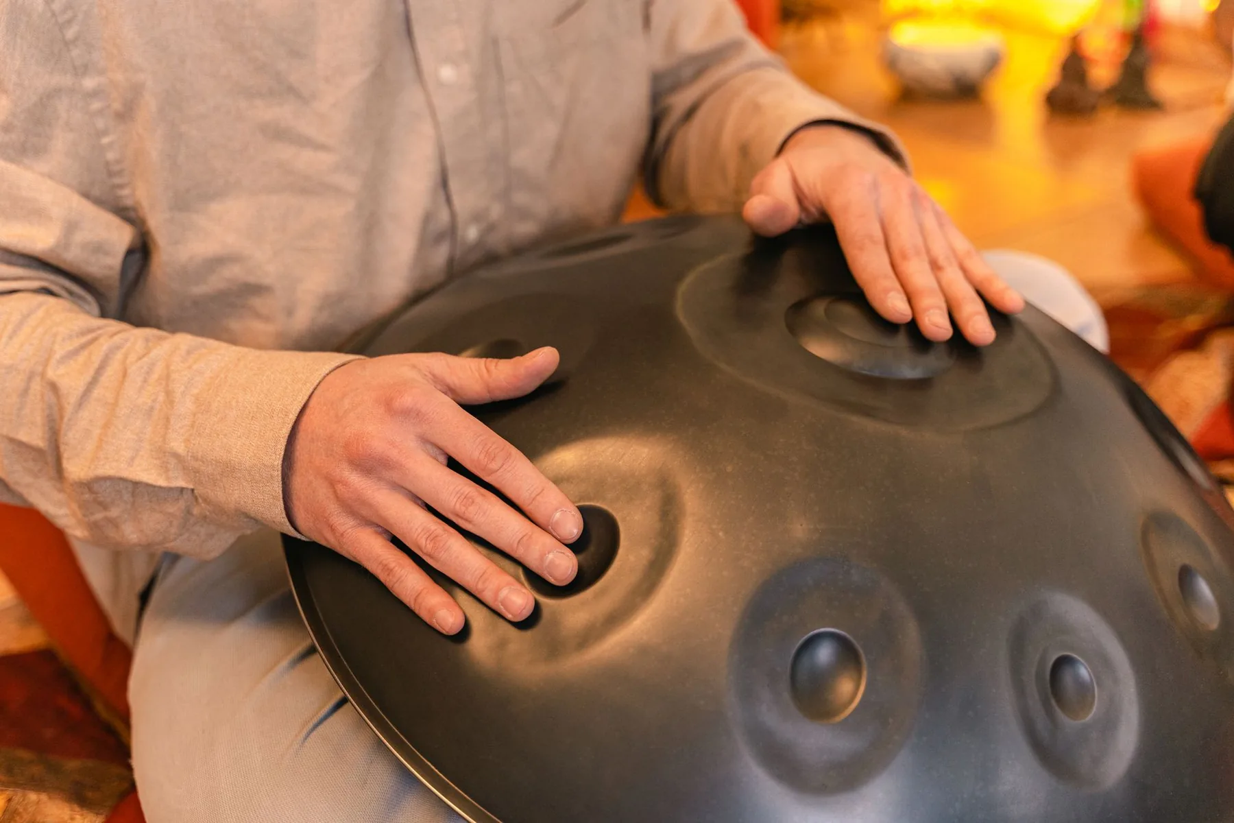 Close-up of a handpan being played