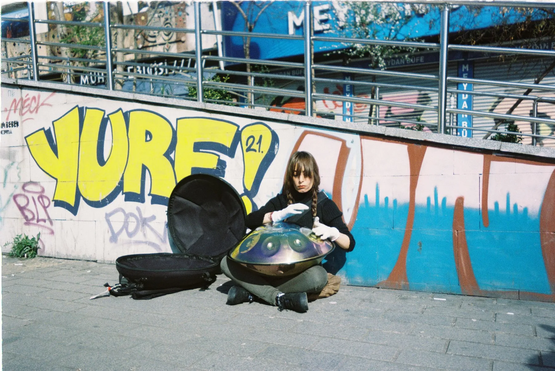 Handpan musician playing outdoors