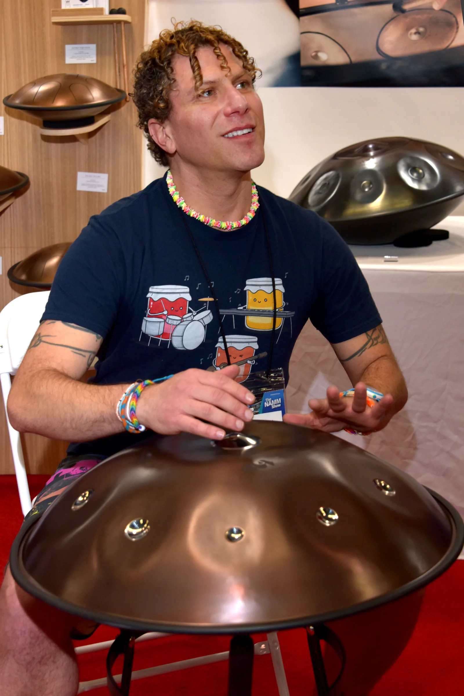 Shiny handpan being played at an exhibition Shiny handpan being played at an exhibition