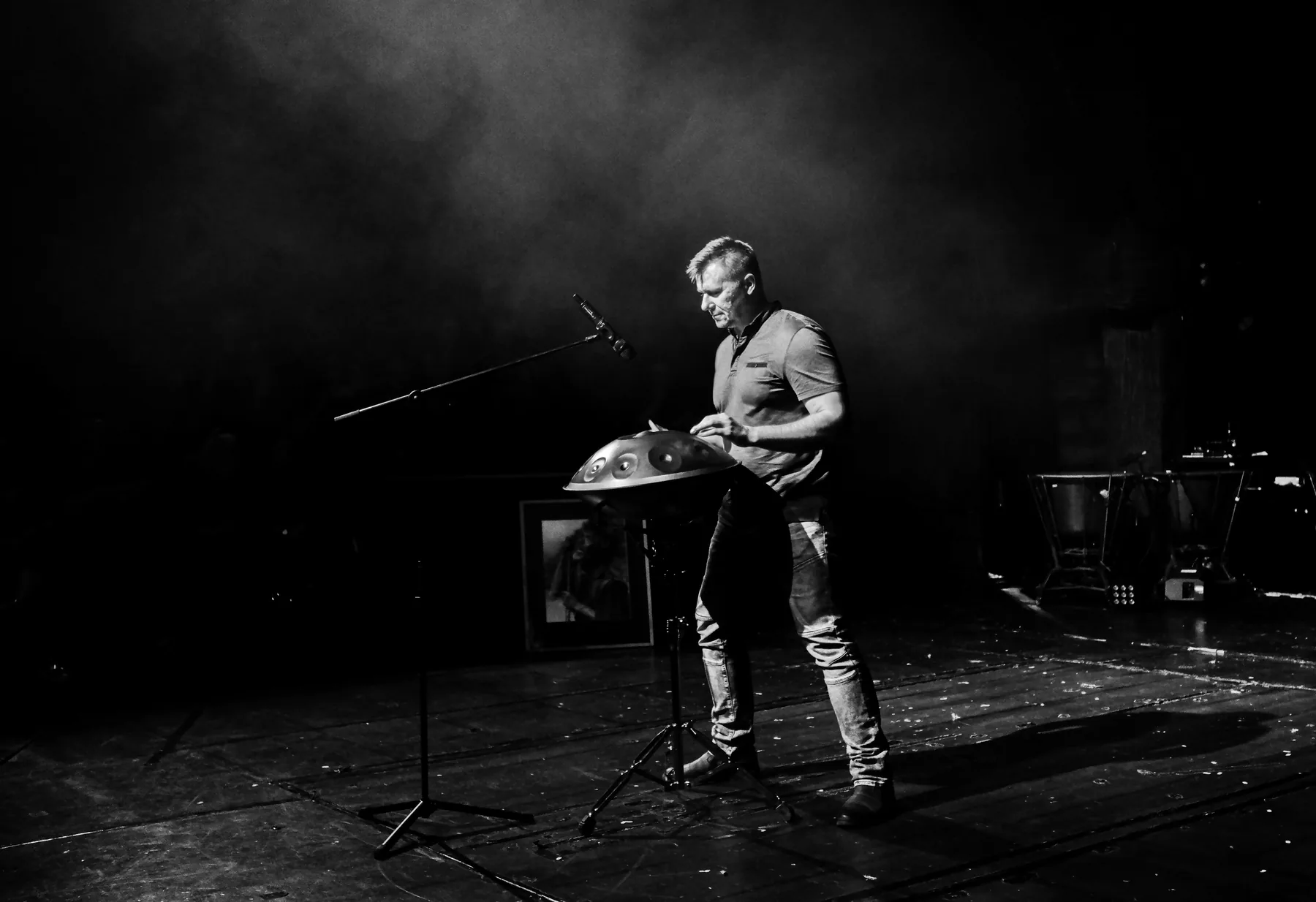 Handpan player on stage Handpan player on stage