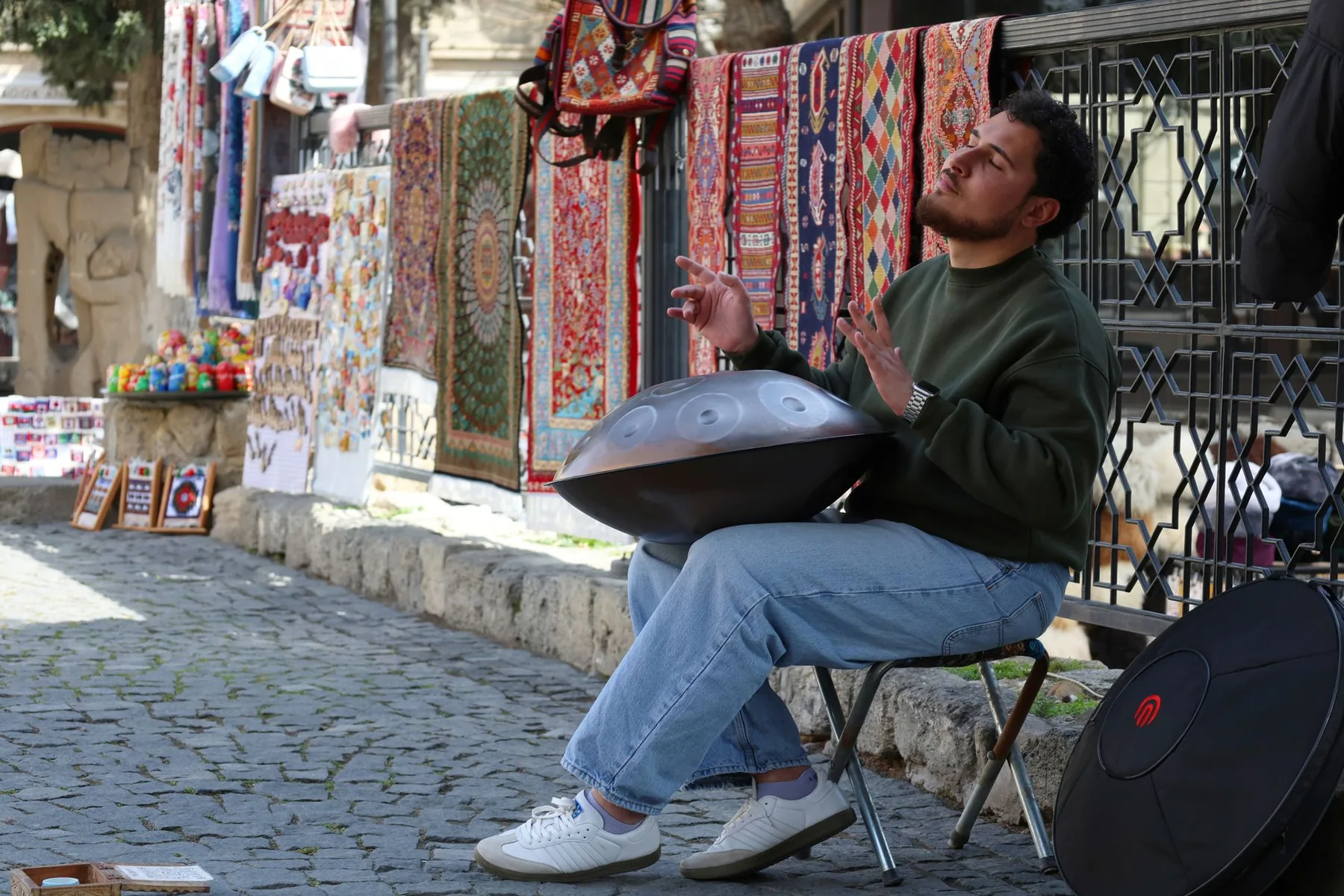 Musician teaching a handpan class Musician teaching a handpan class
