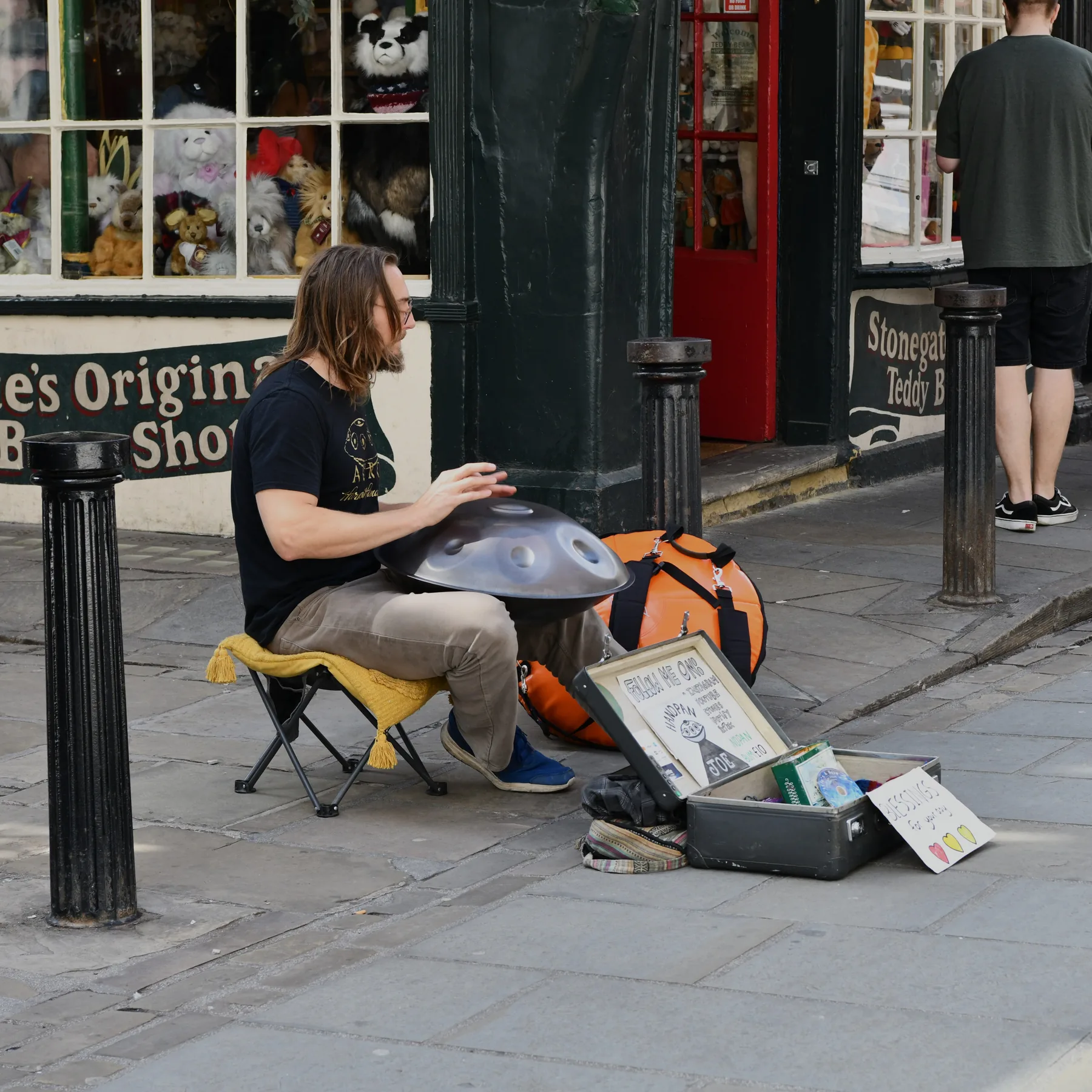 Street musician playing the handpan Street musician playing the handpan