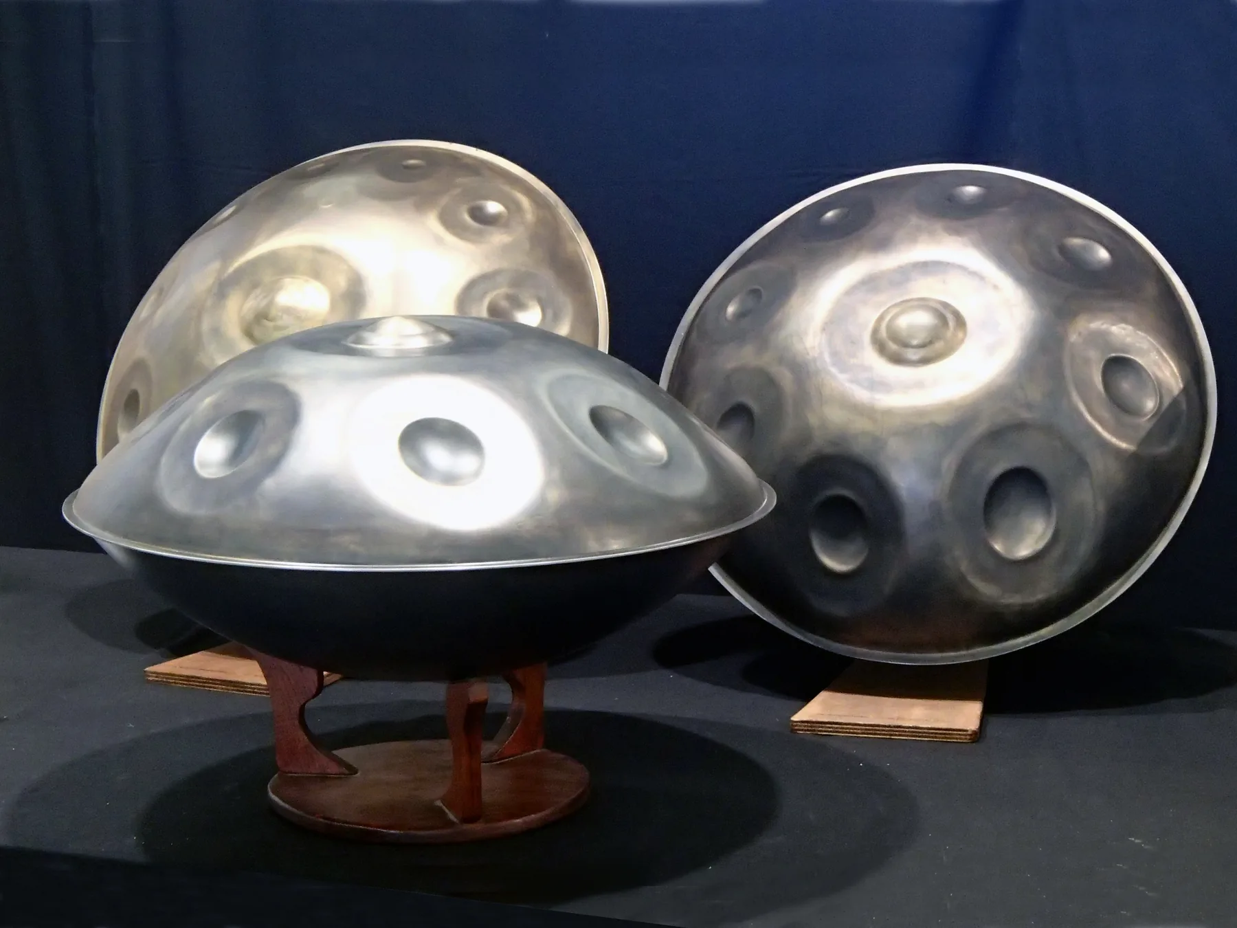 Collection of handcrafted handpans on display