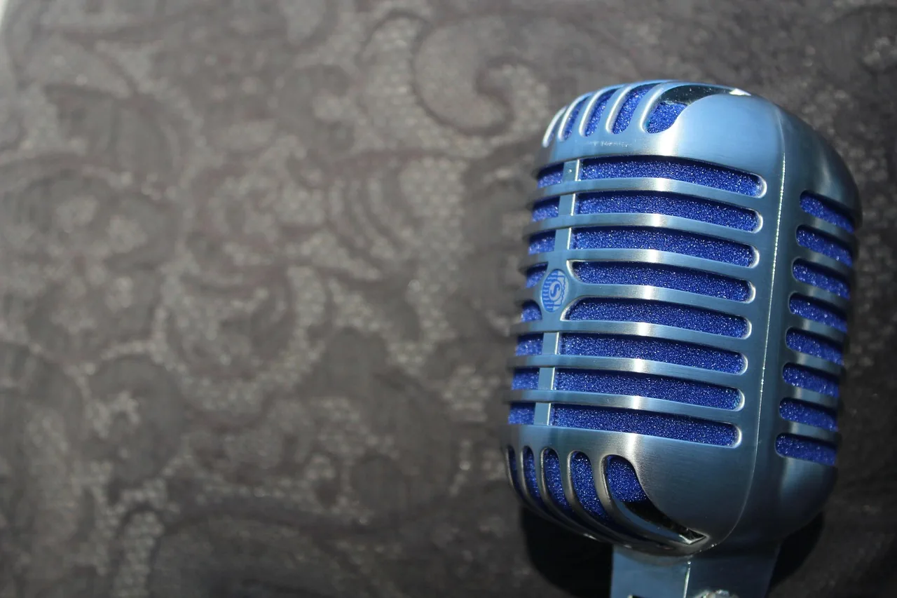 Blue retro microphone for the stage
