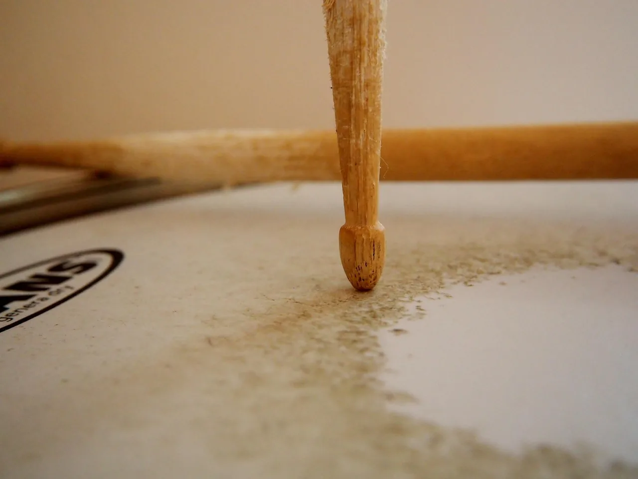 Mallet striking the surface of a drum Mallet striking the surface of a drum